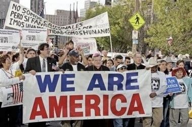 Group of people holding flags.